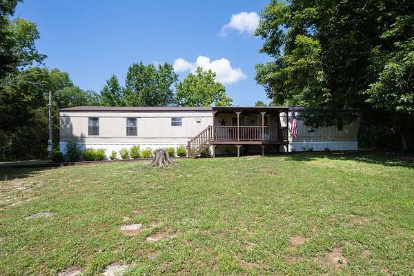 5.3 Acres of Land with Home for Sale in College Grove, Tennessee