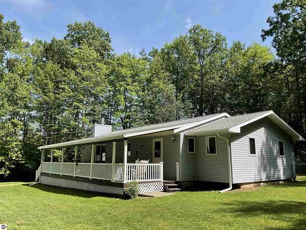 3 Acres of Land with Home for Sale in Harrison, Michigan