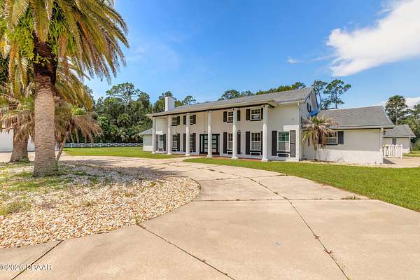 5 Acres of Land with Home for Sale in Port Orange, Florida