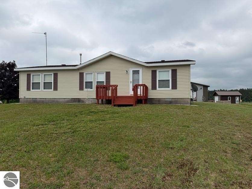 35 Acres of Land with Home for Sale in Kalkaska, Michigan