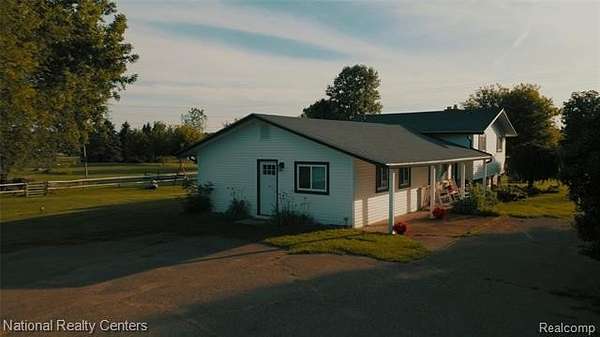 24.9 Acres of Land with Home for Sale in Salem Township, Michigan
