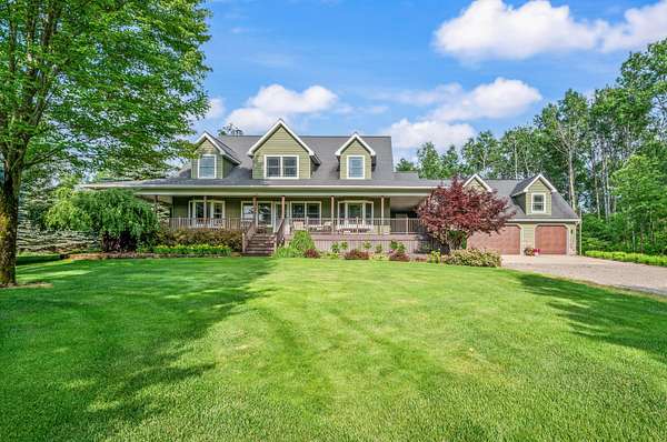 10.9 Acres of Land with Home for Sale in McBain, Michigan