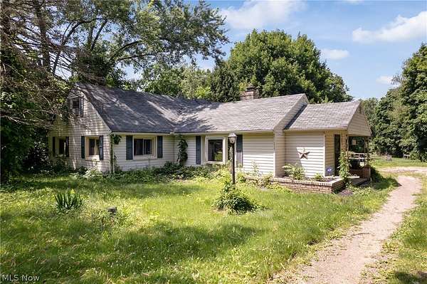 1.64 Acres of Land with Home for Sale in New Franklin, Ohio