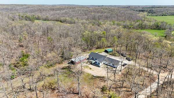 8 Acres of Land with Home for Sale in Glen Allen, Missouri