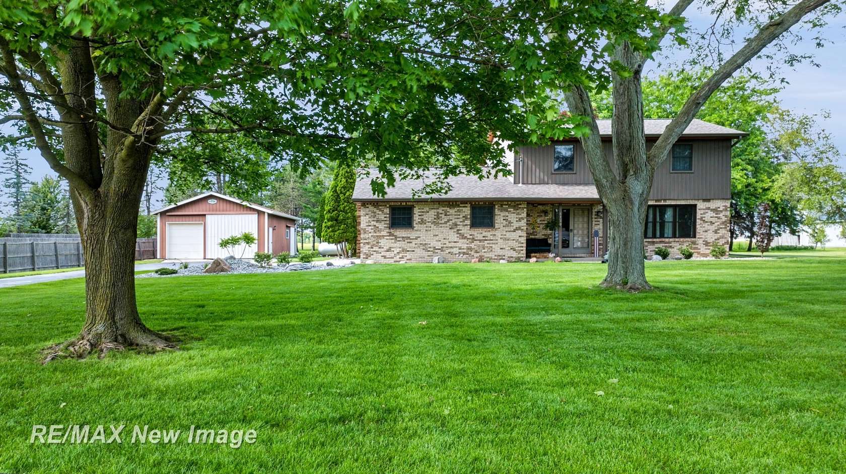 1.5 Acres of Land with Home for Sale in Freeland, Michigan