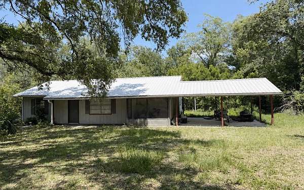 2.84 Acres of Land with Home for Sale in McAlpin, Florida