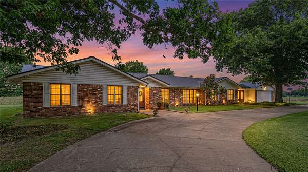 1.5 Acres of Land with Home for Sale in Lone Oak, Texas