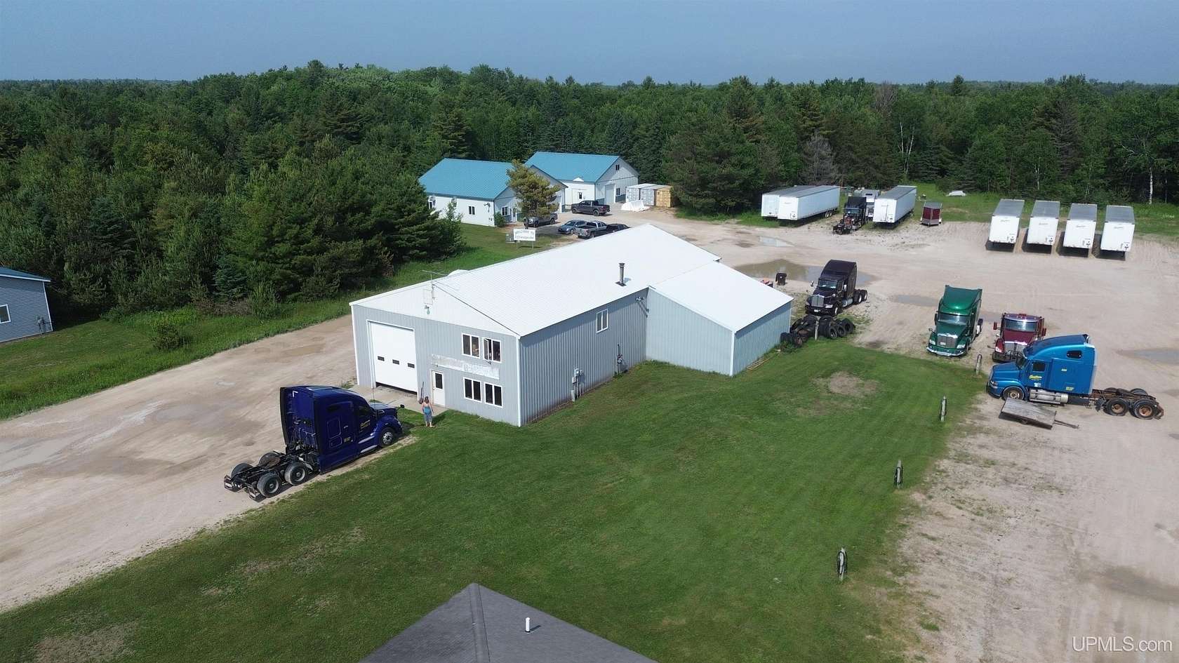 5.3 Acres of Improved Mixed-Use Land for Sale in Manistique, Michigan