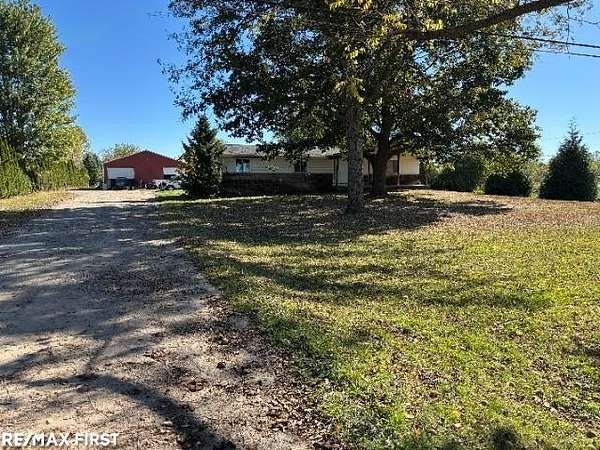 7 Acres of Land with Home for Sale in Ray Township, Michigan