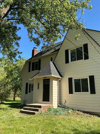2.29 Acres of Land with Home for Sale in Flint, Michigan
