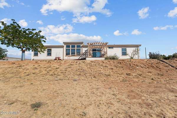 1.76 Acres of Land with Home for Sale in Wilhoit, Arizona