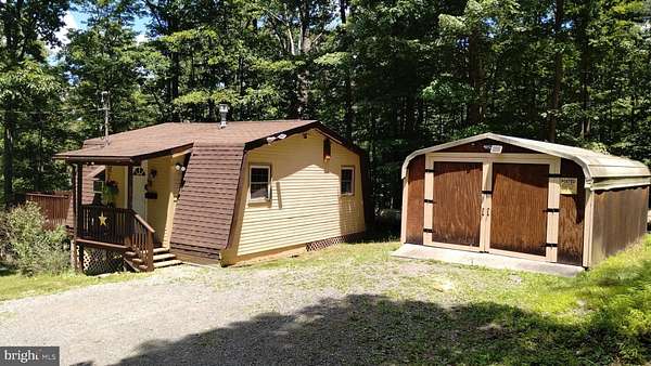 7.42 Acres of Land with Home for Sale in Paw Paw, West Virginia