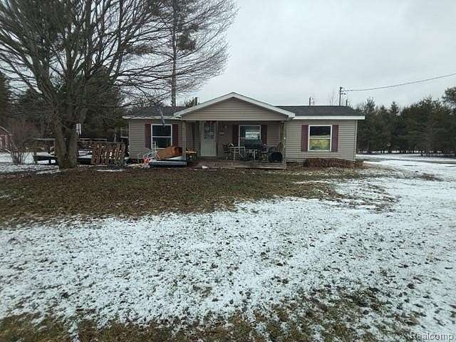 2.3 Acres of Land with Home for Sale in Butman Township, Michigan