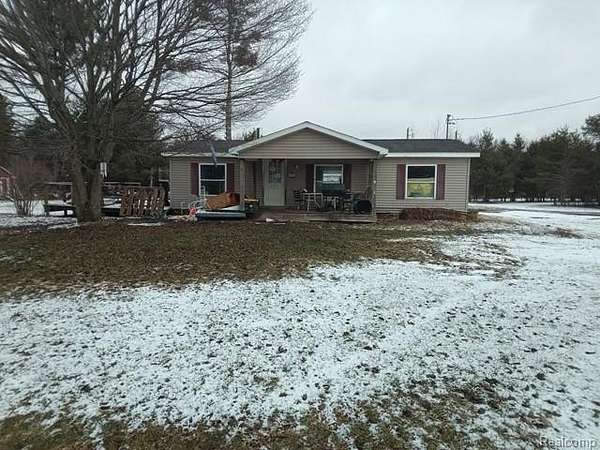 2.3 Acres of Land with Home for Sale in Butman Township, Michigan