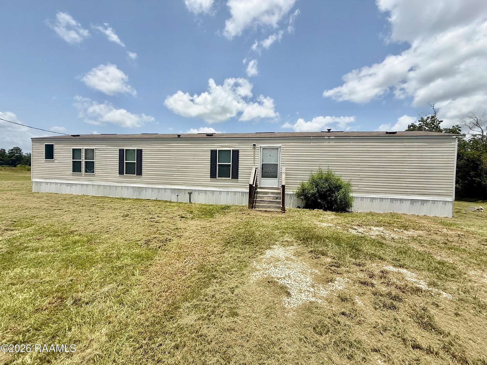 2 Acres of Land with Home for Sale in Iowa, Louisiana