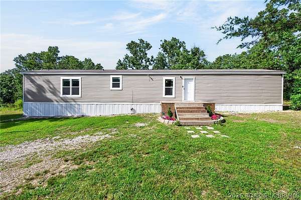 5 Acres of Land with Home for Sale in High Prairie Township, Missouri