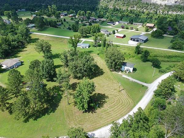 1.58 Acres of Land with Home for Sale in Norfork, Arkansas