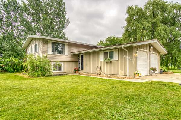 2 Acres of Land with Home for Sale in Six Lakes, Michigan