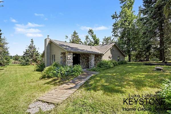 10 Acres of Recreational Land with Home for Sale in Atlanta, Michigan