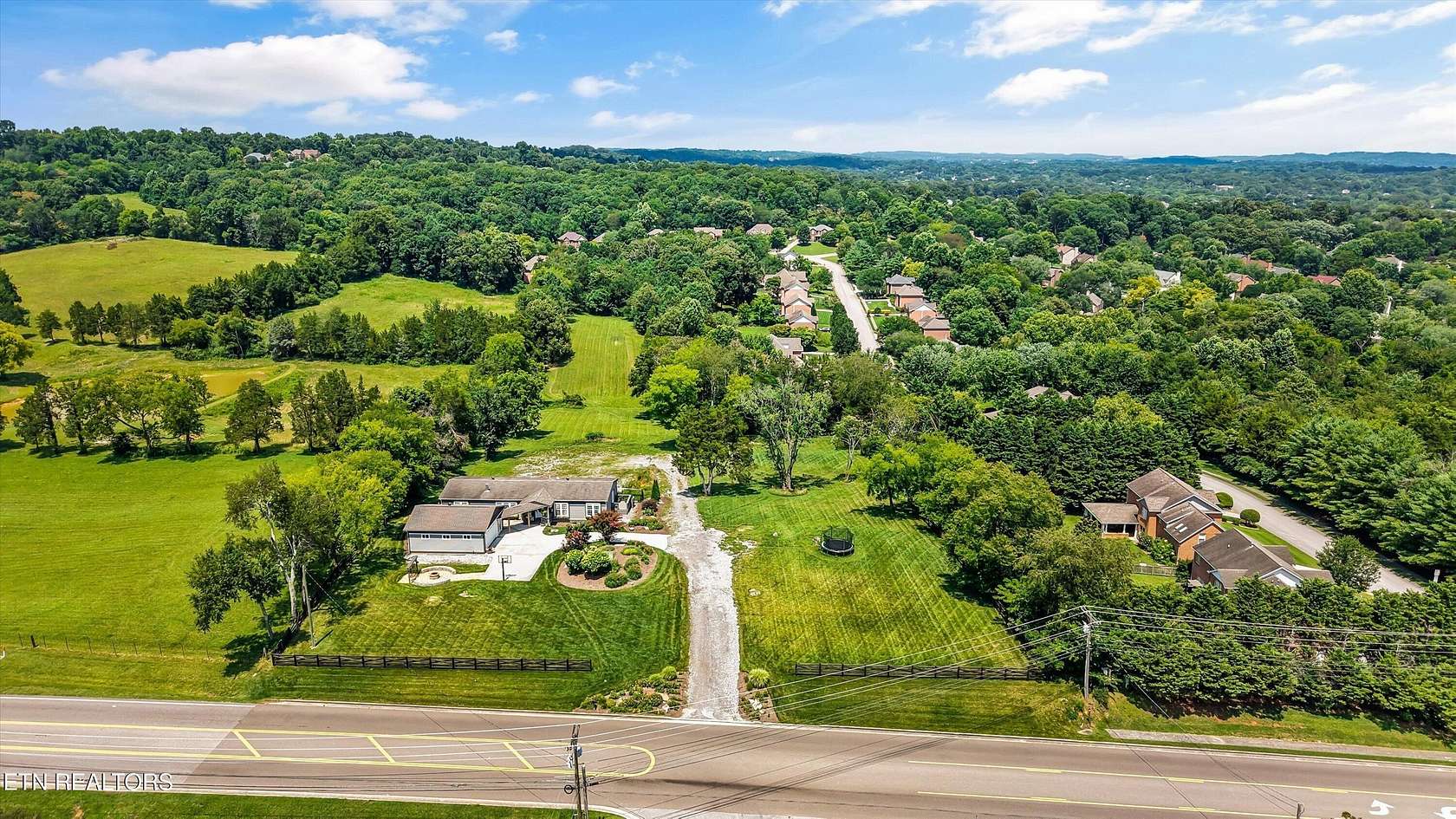 4.89 Acres of Land with Home for Sale in Knoxville, Tennessee