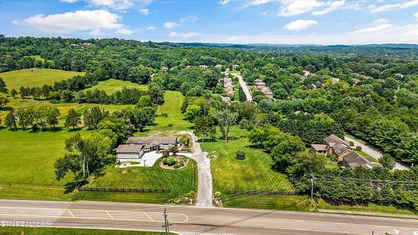 4.89 Acres of Land with Home for Sale in Knoxville, Tennessee