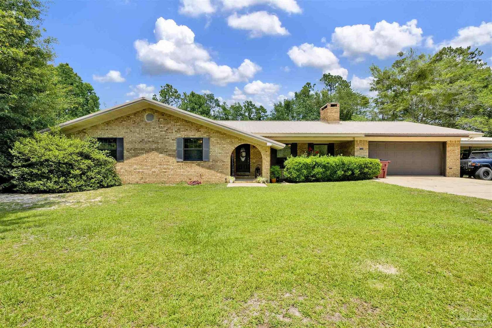 5.1 Acres of Land with Home for Sale in Pace, Florida