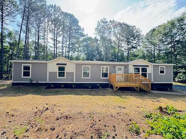 1.55 Acres of Land with Home for Sale in Crandall, Georgia