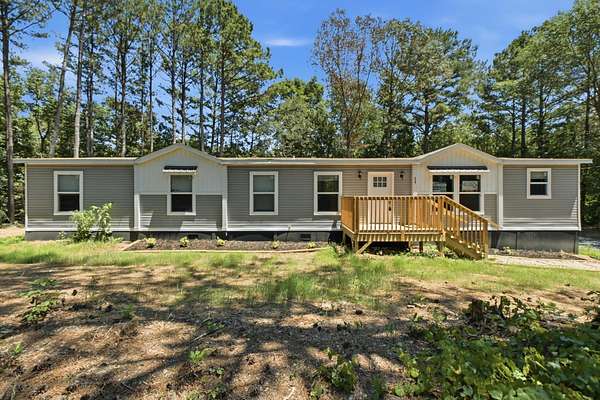 1.55 Acres of Land with Home for Sale in Crandall, Georgia