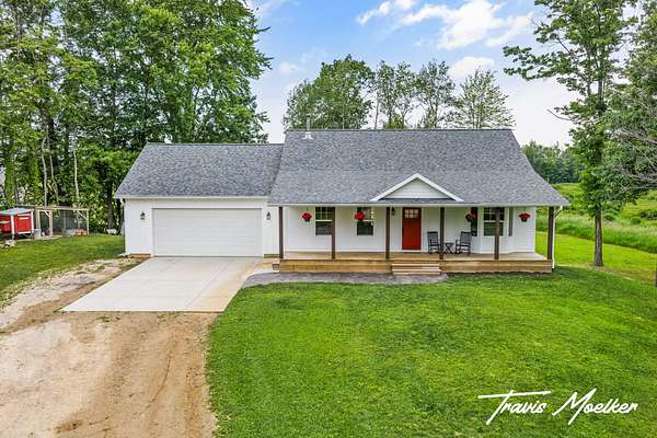 4.55 Acres of Land with Home for Sale in Sand Lake, Michigan