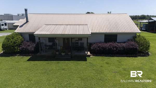 17.6 Acres of Land with Home for Sale in Loxley, Alabama
