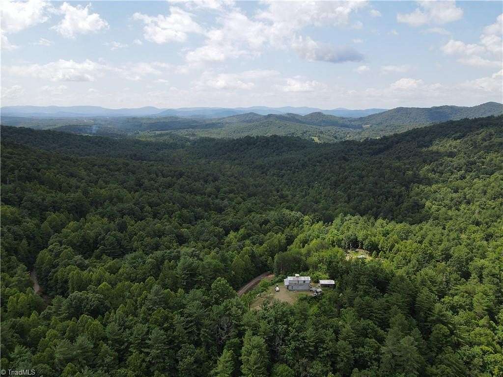 5.34 Acres of Land with Home for Sale in Purlear, North Carolina