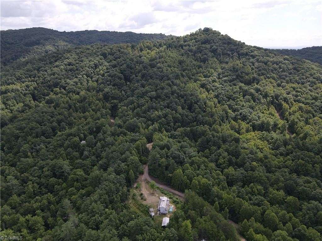 5.34 Acres of Land with Home for Sale in Purlear, North Carolina