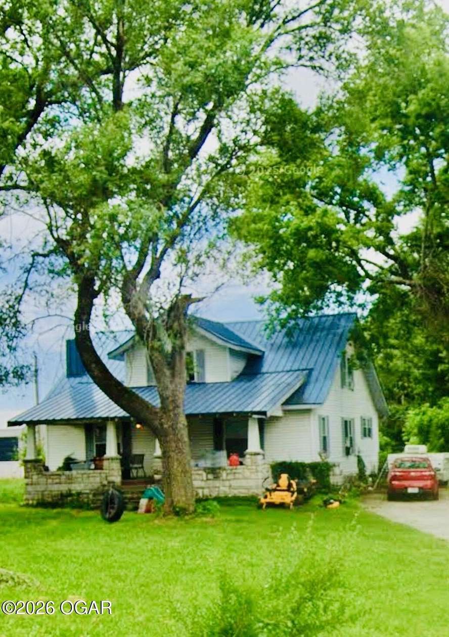 5 Acres of Land with Home for Sale in Carthage, Missouri