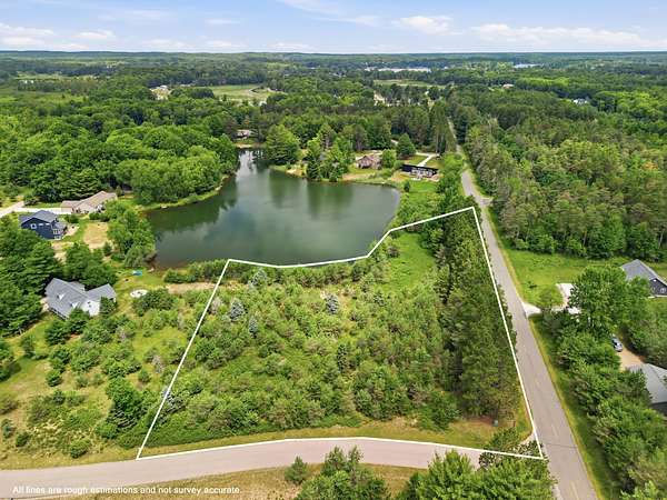 1.48 Acres of Residential Land for Sale in Canadian Lakes, Michigan