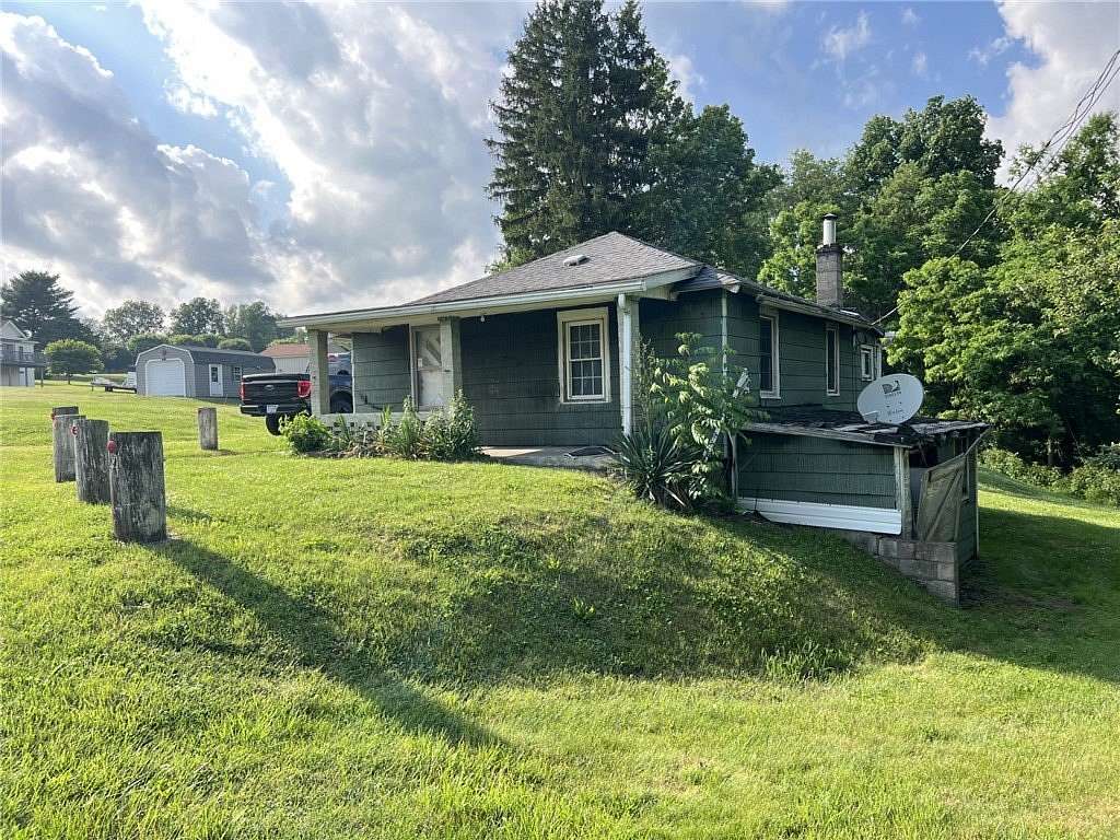 6.9 Acres of Land with Home for Sale in Uniontown, Pennsylvania