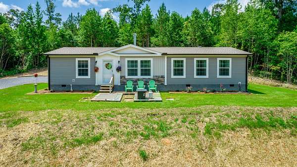 10 Acres of Land with Home for Sale in Rocky Face, Georgia