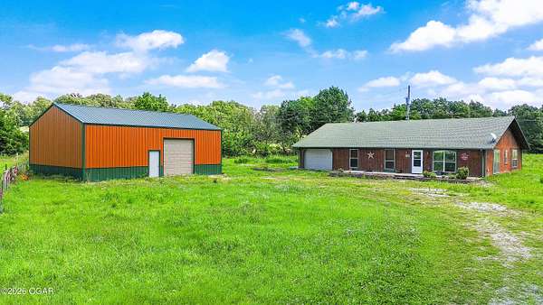 5.7 Acres of Land with Home for Sale in Seneca, Missouri