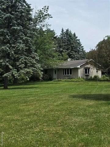 2 Acres of Land with Home for Sale in Hadley Township, Michigan
