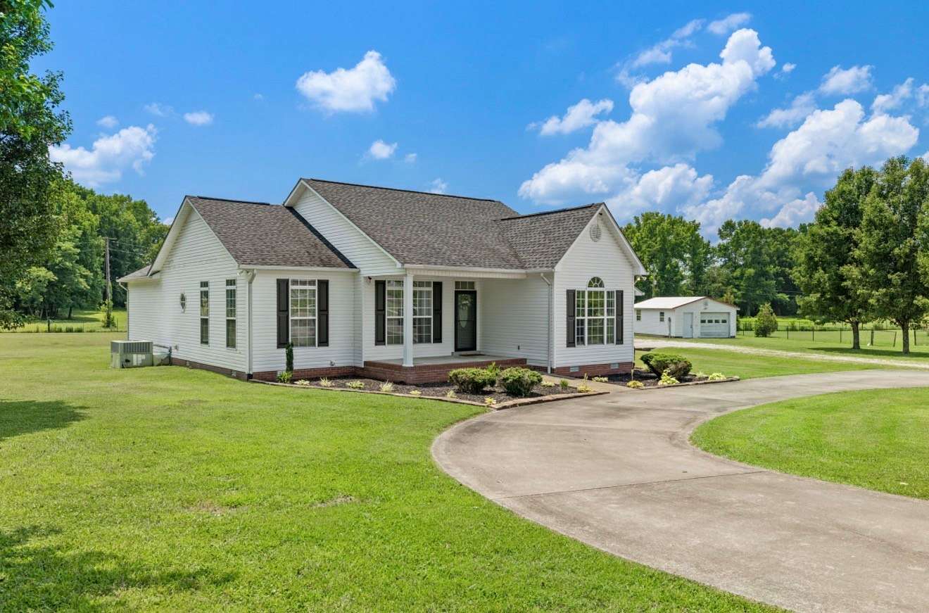 7.2 Acres of Land with Home for Sale in Leoma, Tennessee