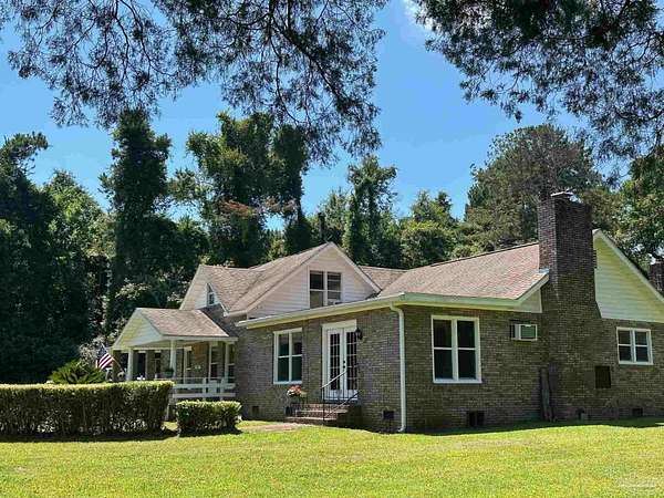 3.6 Acres of Land with Home for Sale in Jay, Florida