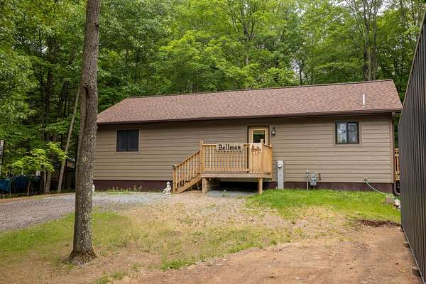 5 Acres of Land with Home for Sale in Eagle River, Wisconsin