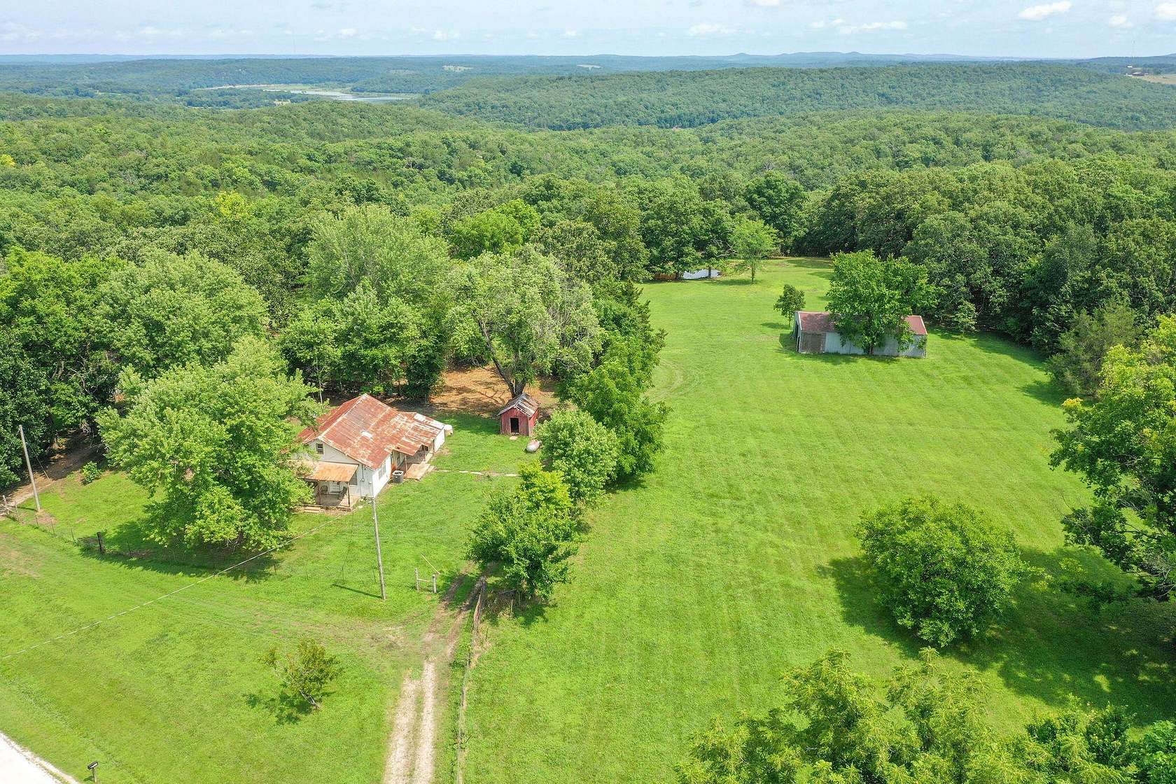 12.5 Acres of Land with Home for Sale in Cedarcreek, Missouri