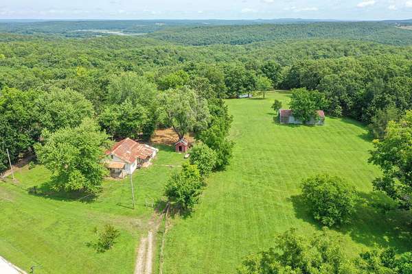 12.5 Acres of Land with Home for Sale in Cedarcreek, Missouri