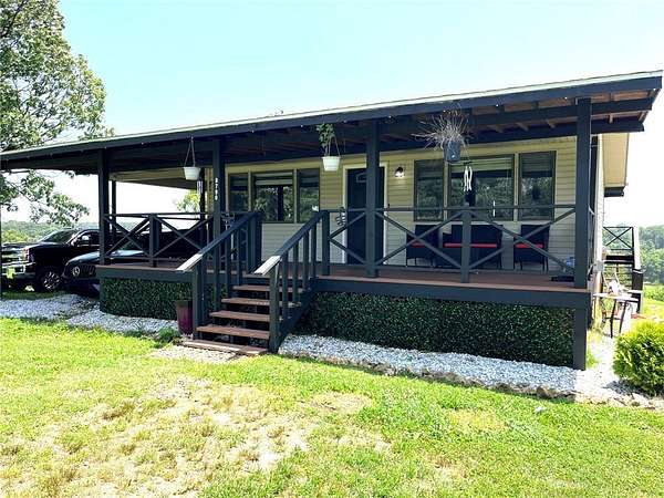 5 Acres of Land with Home for Sale in Decatur, Arkansas