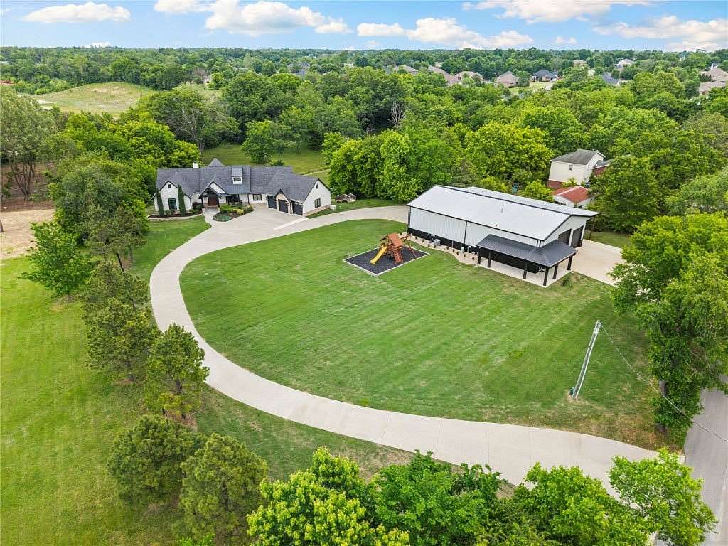 6 Acres of Land with Home for Sale in Cave Springs, Arkansas