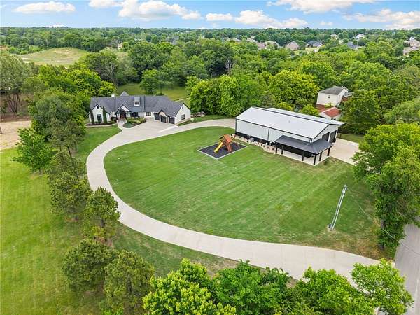 6 Acres of Land with Home for Sale in Cave Springs, Arkansas