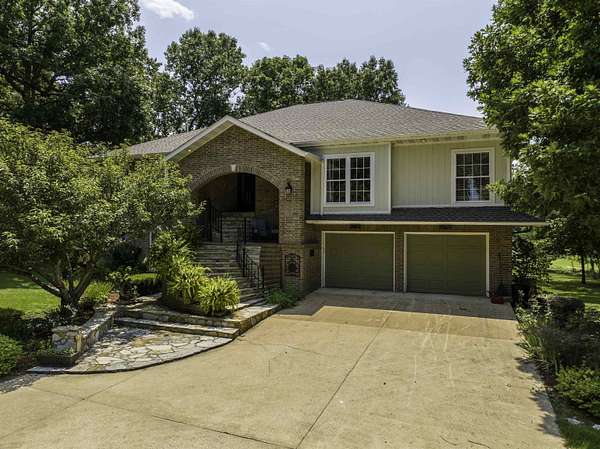 2.23 Acres of Land with Home for Sale in Cherokee Village, Arkansas