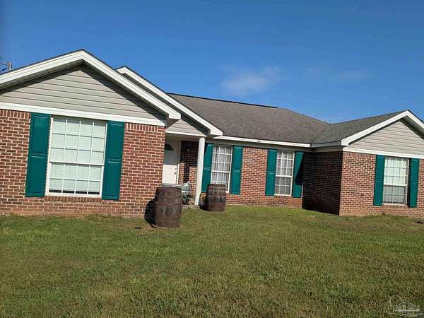 5 Acres of Land with Home for Sale in Atmore, Alabama