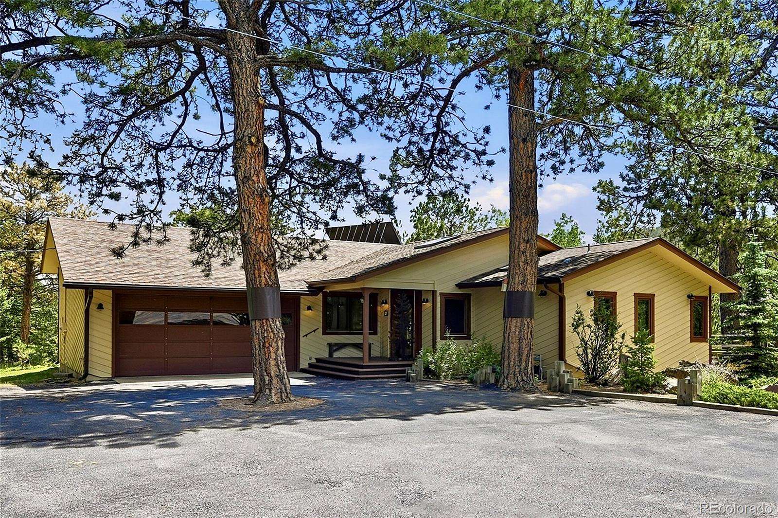 6.4 Acres of Land with Home for Sale in Evergreen, Colorado
