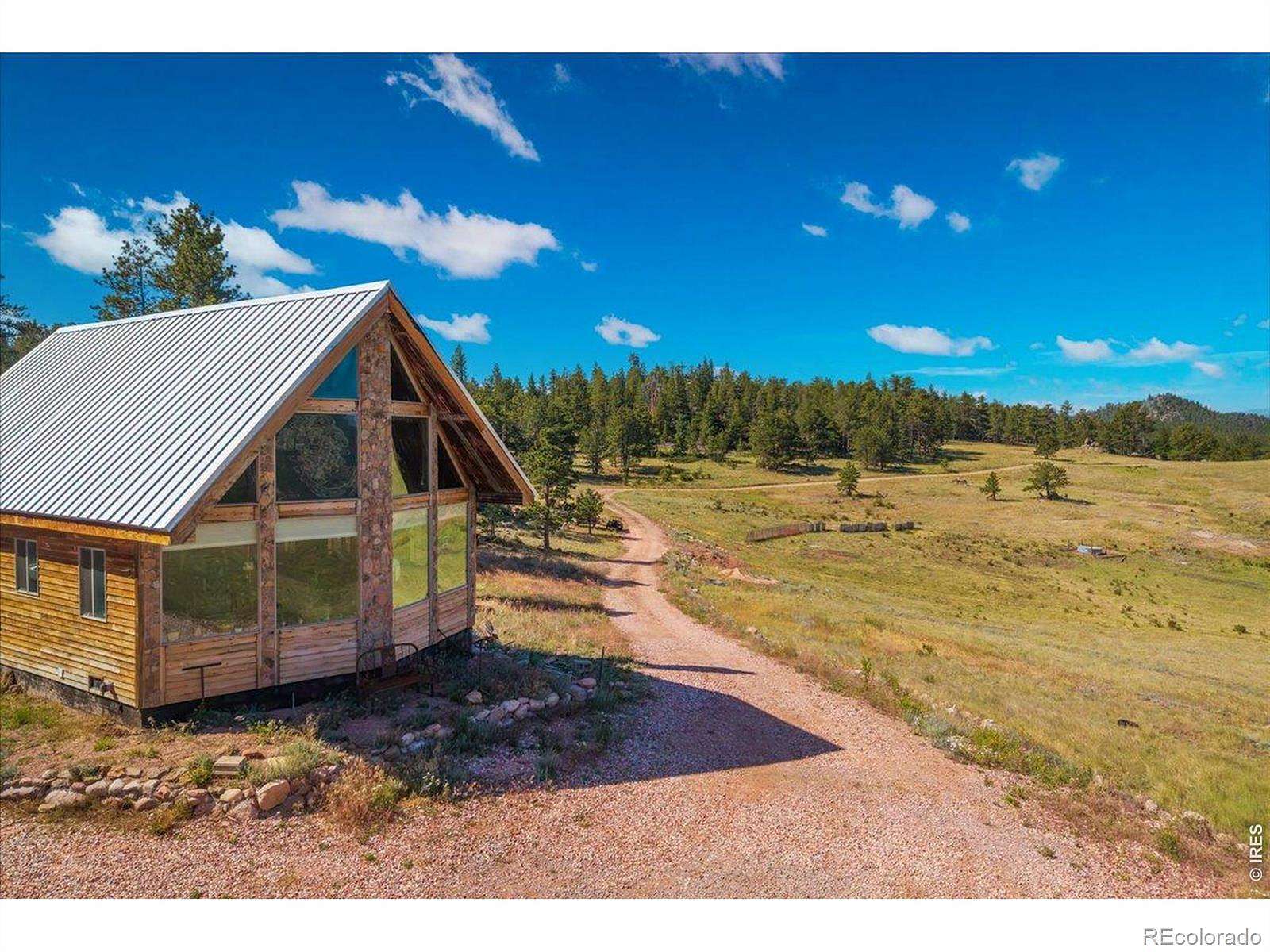 35 Acres of Recreational Land with Home for Sale in Red Feather Lakes, Colorado